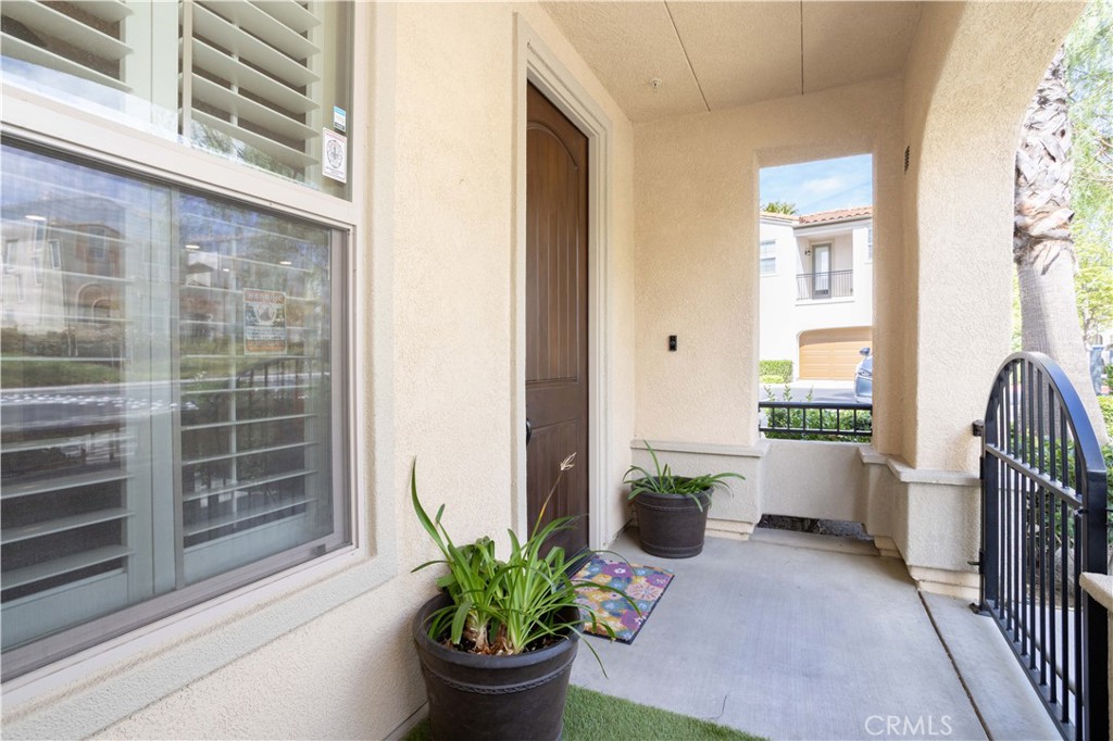 20335 Paseo Meriana Porter Ranch, CA 91326 - Photo 27 of 58 Charming Entryway Featuring a Private Enclosed Patio