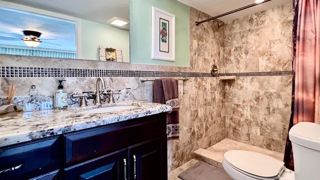 a backyard of a house with seating space