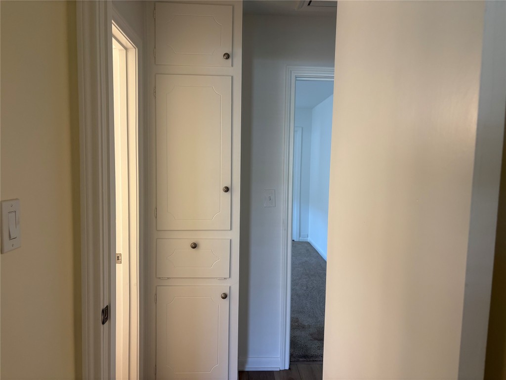 1111 Burning Tree Road Kingwood, TX 77339 - Photo 20 of 32 There is a convenient linen closet with built-in hamper, located just outside the guest bathroom.