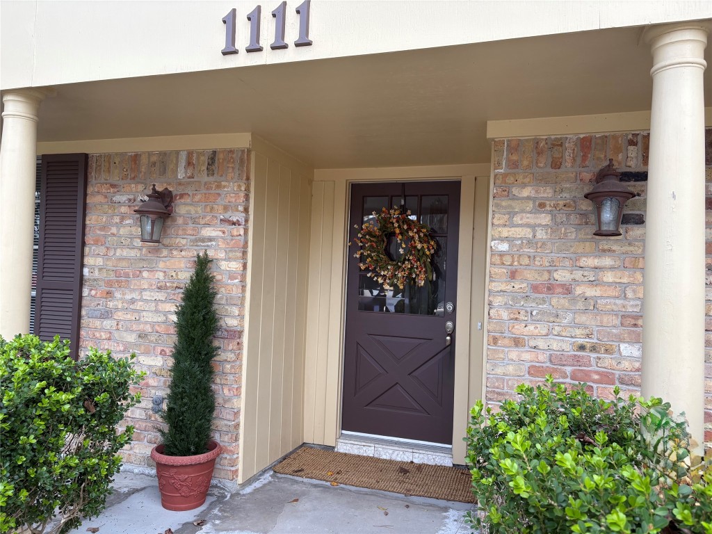 1111 Burning Tree Road Kingwood, TX 77339 - Photo 3 of 32 This elegant brick home boasts fresh 2025 exterior paint, a lifetime foundation warranty, and a Lift Locke roof certification for peace of mind.