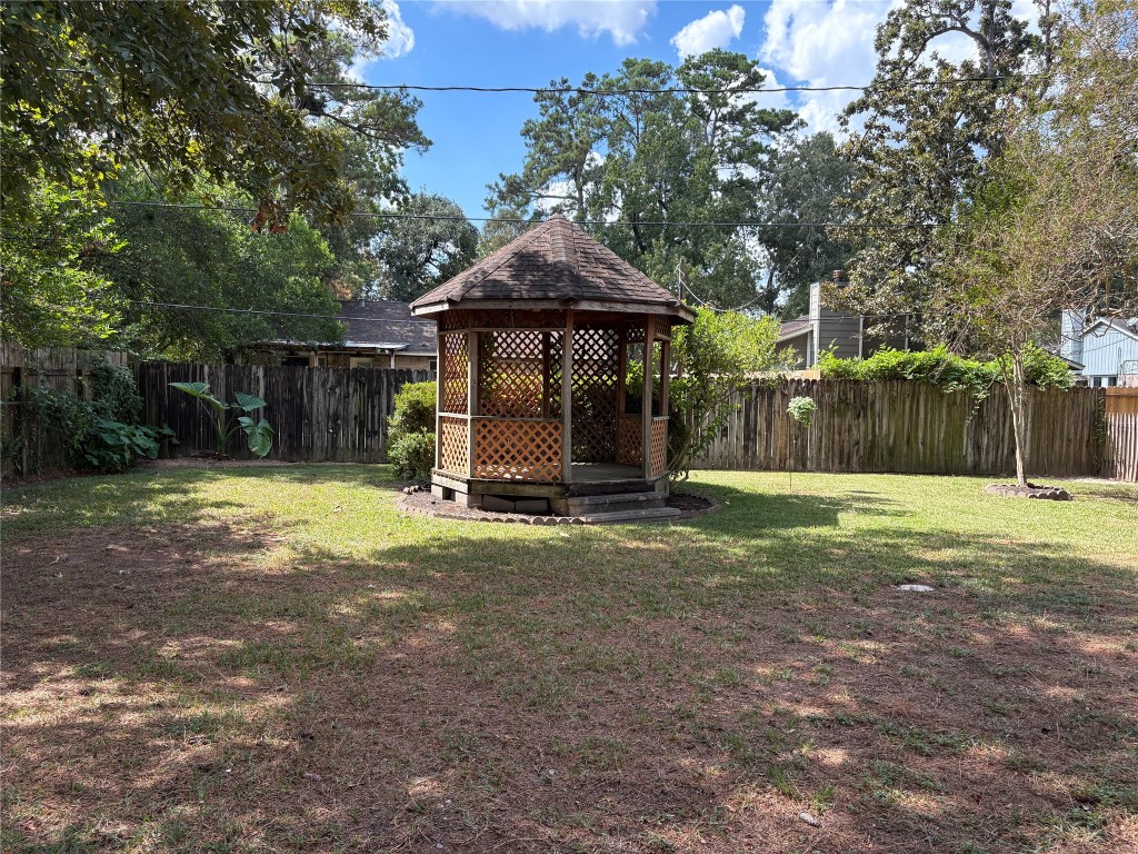 1111 Burning Tree Road Kingwood, TX 77339 - Photo 32 of 32 Gazebo for additional shade and relaxation