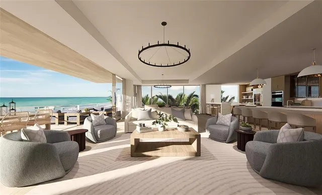 a living room with furniture potted plant and a large window