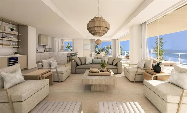 a living room with furniture a rug and a chandelier