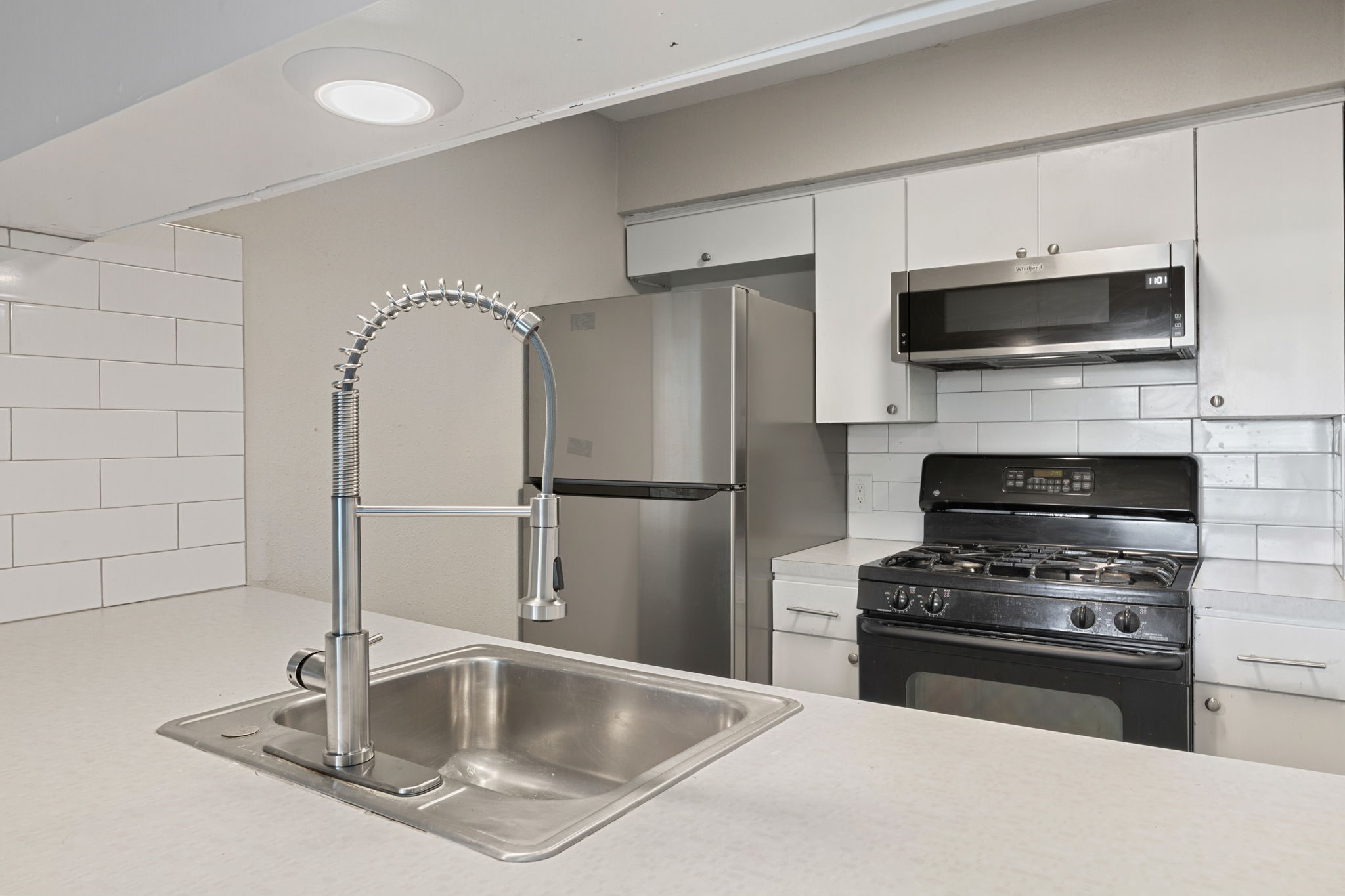 5005 Manor Road, Unit 232 Austin, TX 78723 - Photo 4 of 26 Updated kitchen featuring stainless steel appliances