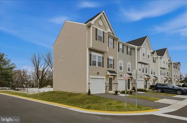 a aerial view of a house with a yard