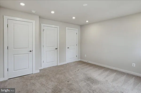a bathroom with a shower and sink