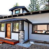 a front view of a house with a porch