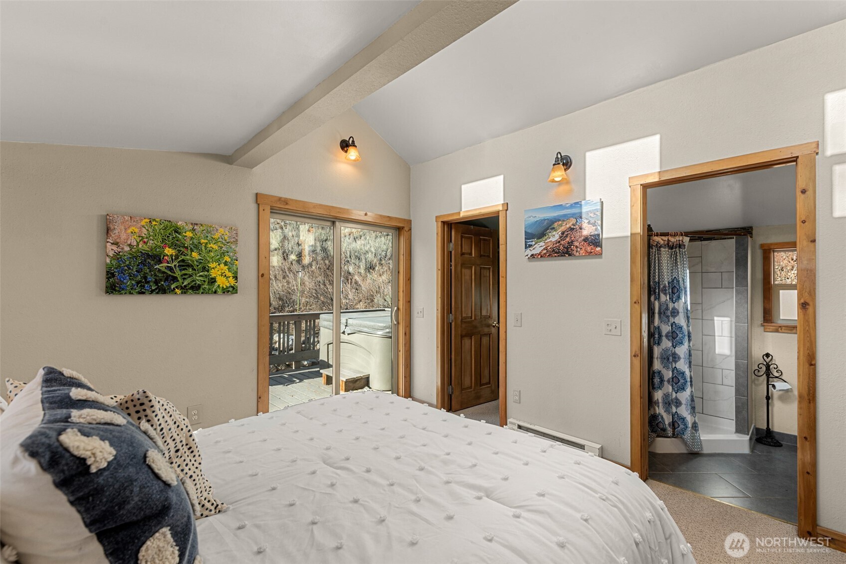 75 Purtteman Gulch Road Chelan, WA 98816 - Photo 19 of 40 a bedroom with a bed and a dresser