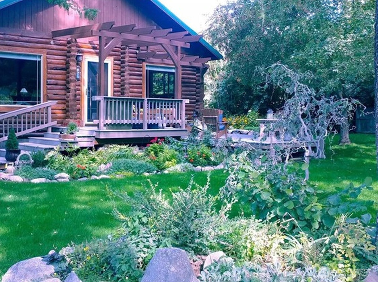 75 Purtteman Gulch Road Chelan, WA 98816 - Photo 27 of 40 a front view of a house with a yard