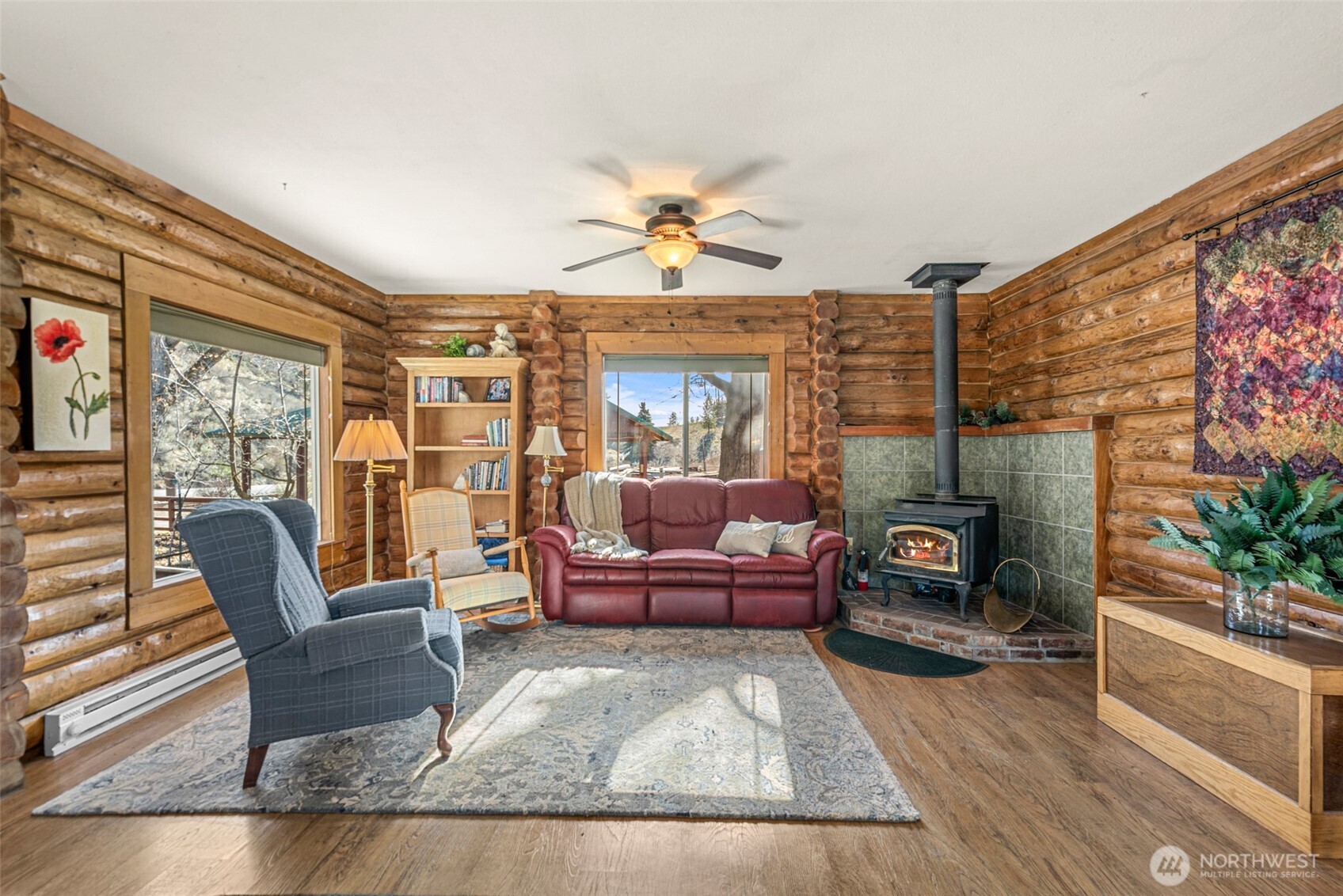 75 Purtteman Gulch Road Chelan, WA 98816 - Photo 5 of 40 a living room with furniture and a fireplace