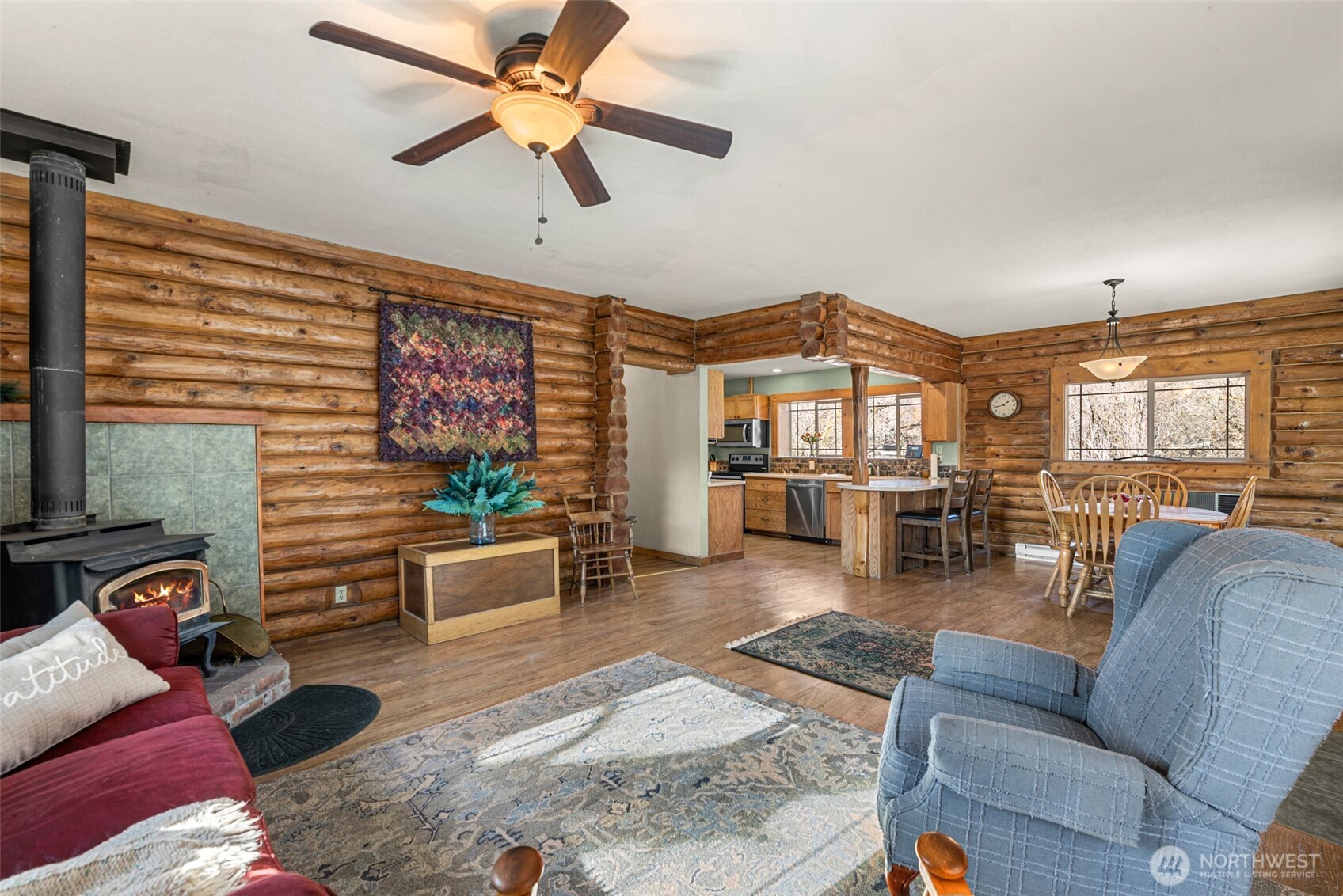 75 Purtteman Gulch Road Chelan, WA 98816 - Photo 6 of 40 a living room with furniture and a floor to ceiling window