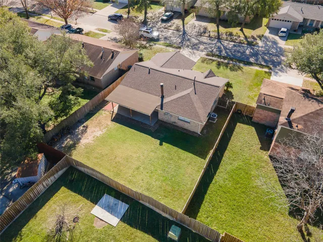 a view of a pool with chairs