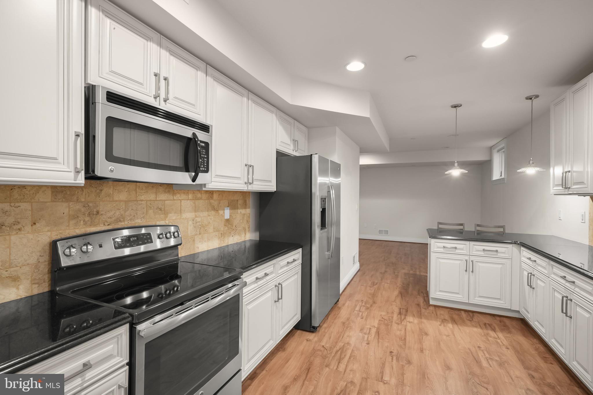 6314 Walhonding Road Bethesda, MD 20816 - Photo 36 of 46 Lower Level - Kitchen