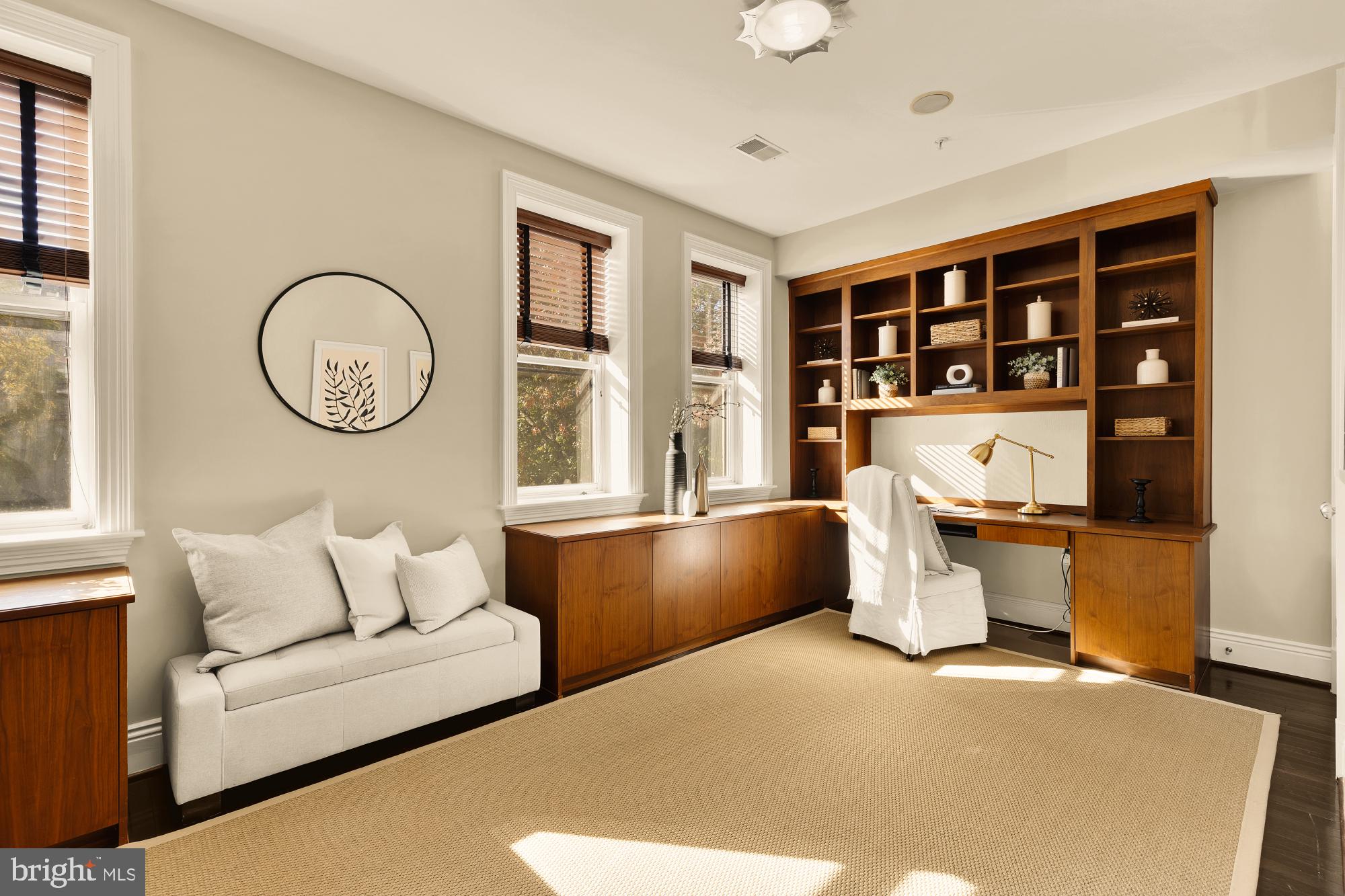 1533 P Street Northwest, Unit 5 Washington, DC 20005 - Photo 20 of 28 a living room with furniture and a window