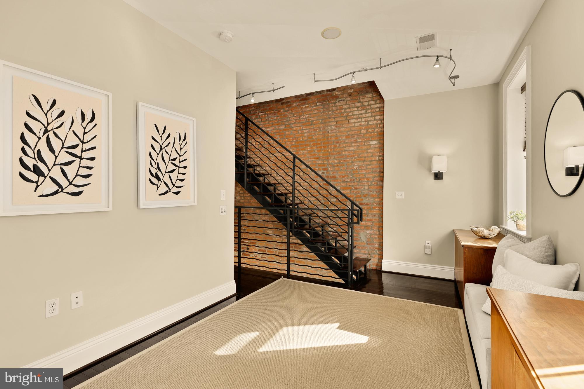 1533 P Street Northwest, Unit 5 Washington, DC 20005 - Photo 22 of 28 a view of entryway and hall with wooden floor