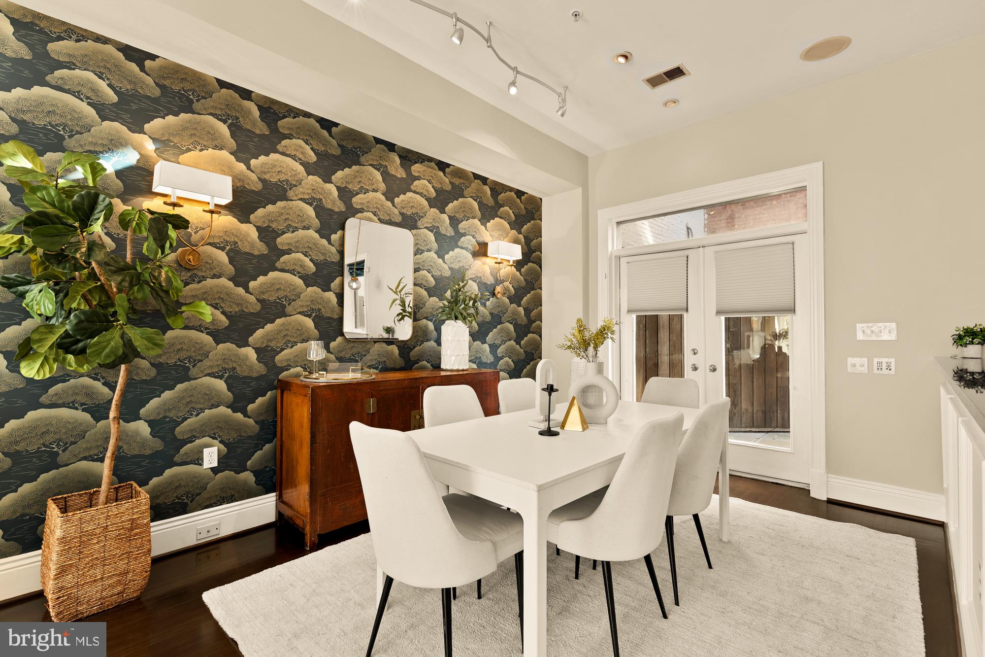 1533 P Street Northwest, Unit 5 Washington, DC 20005 - Photo 8 of 28 a view of a dining room with furniture and wooden floor