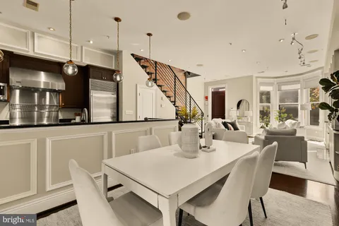 a view of a dining room with furniture