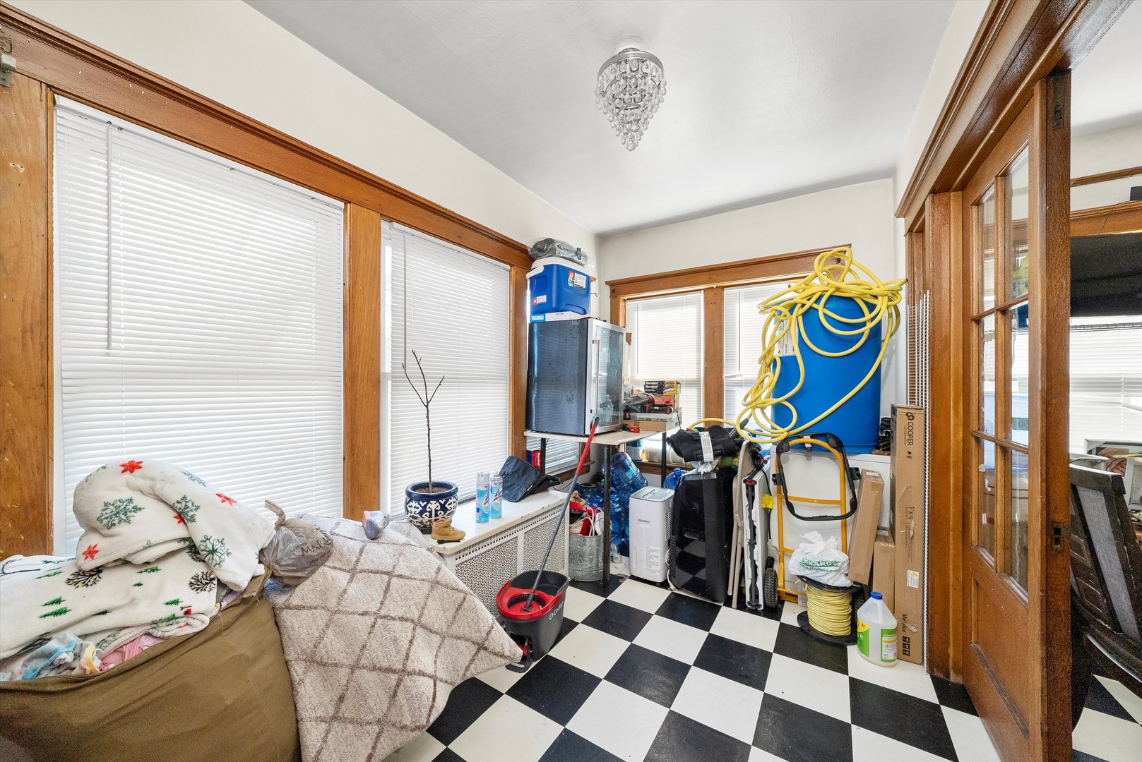 2345 South 59th Court Cicero, IL 60804 - Photo 12 of 36 a room with furniture and window