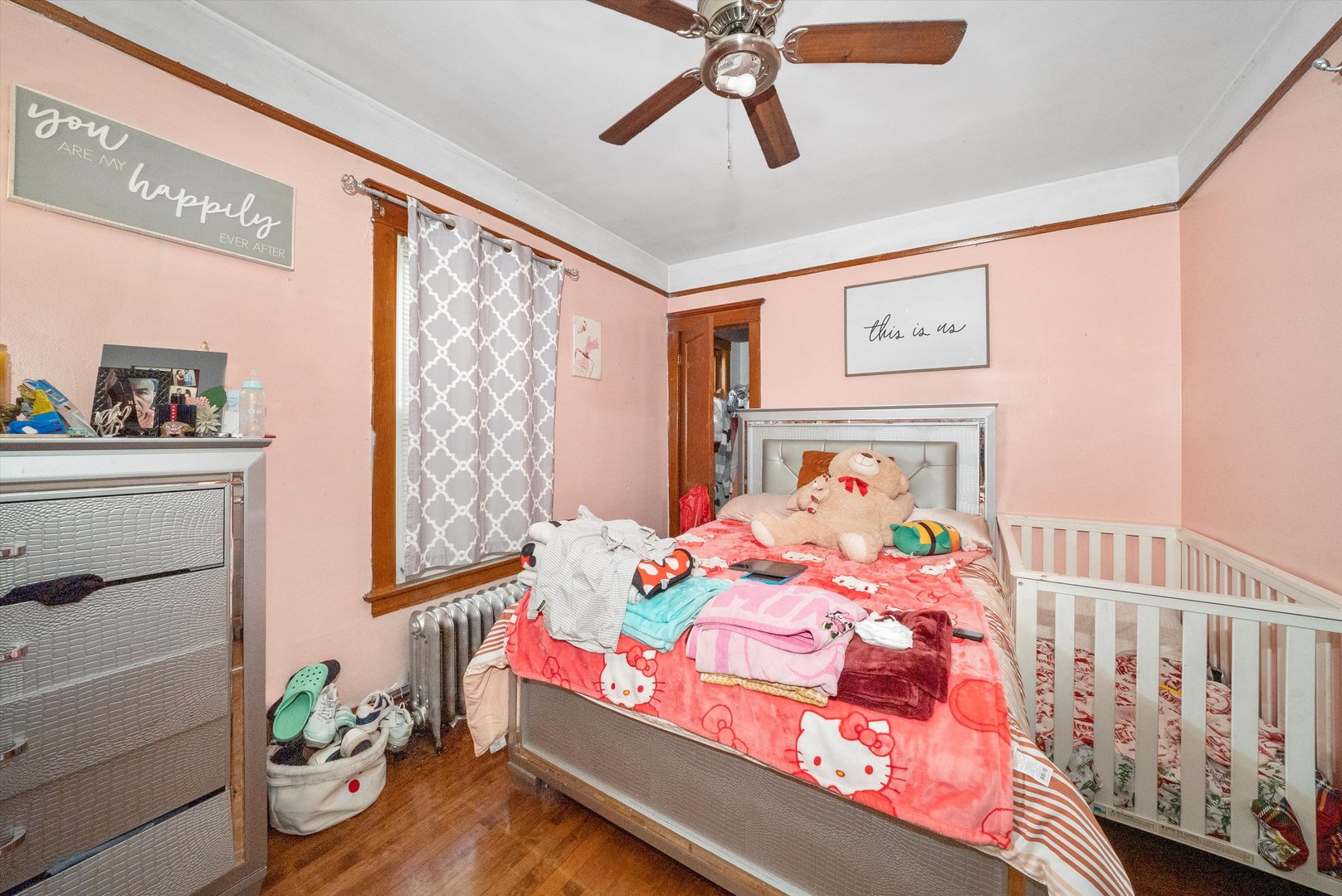 2345 South 59th Court Cicero, IL 60804 - Photo 15 of 36 a bedroom with a bed and a window