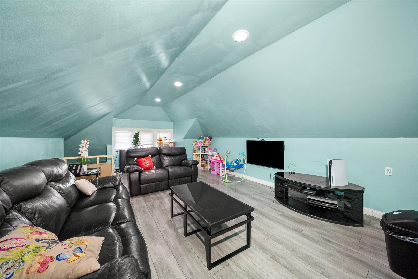 2345 South 59th Court Cicero, IL 60804 - Photo 18 of 36 a living room with furniture and a flat screen tv