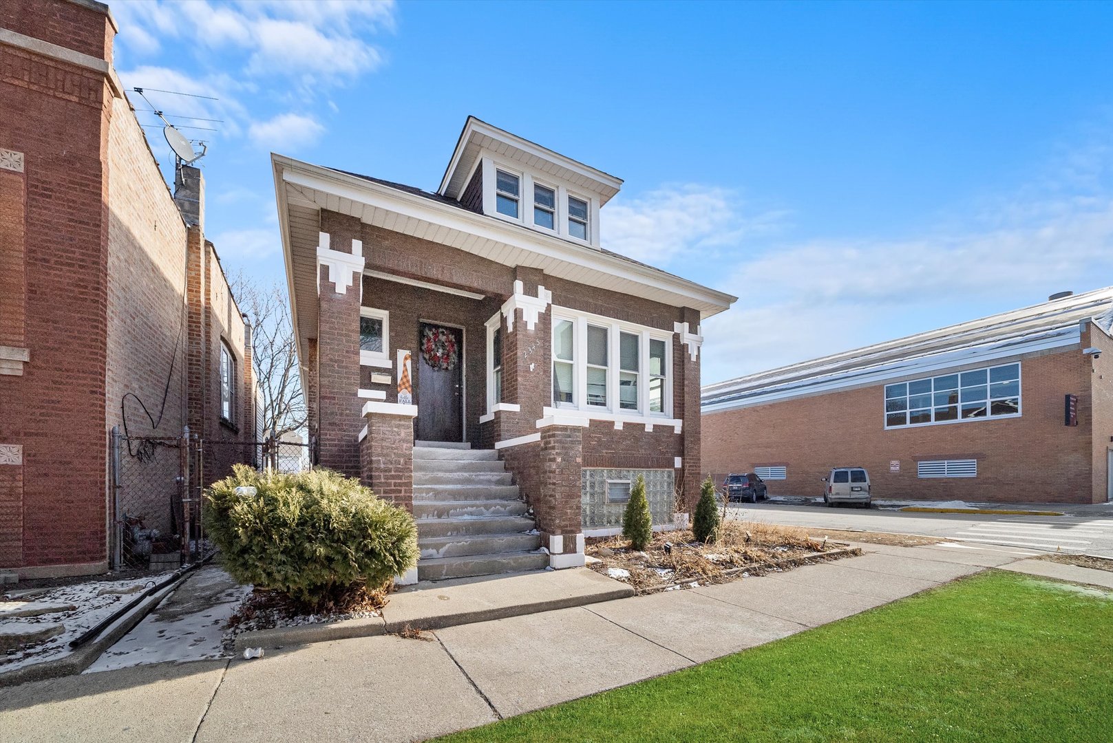 2345 South 59th Court Cicero, IL 60804 - Photo 2 of 36 a front view of a house with garden