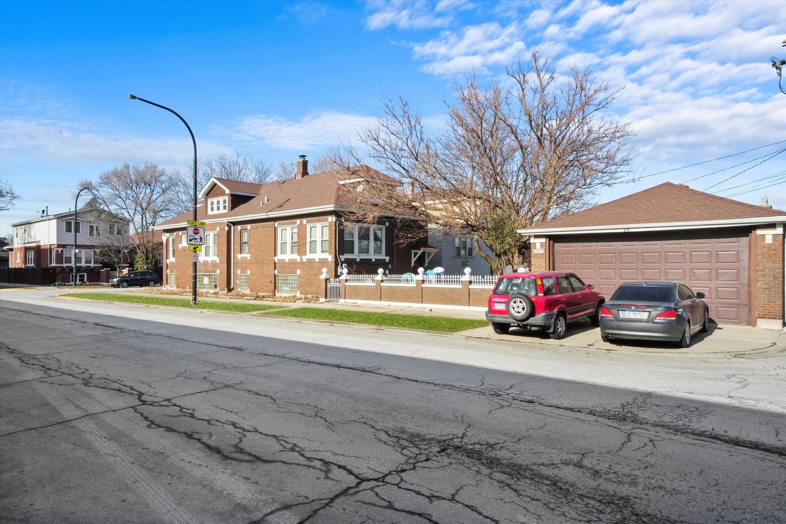 2345 South 59th Court Cicero, IL 60804 - Photo 28 of 36 a view of a car is parked in front of a building