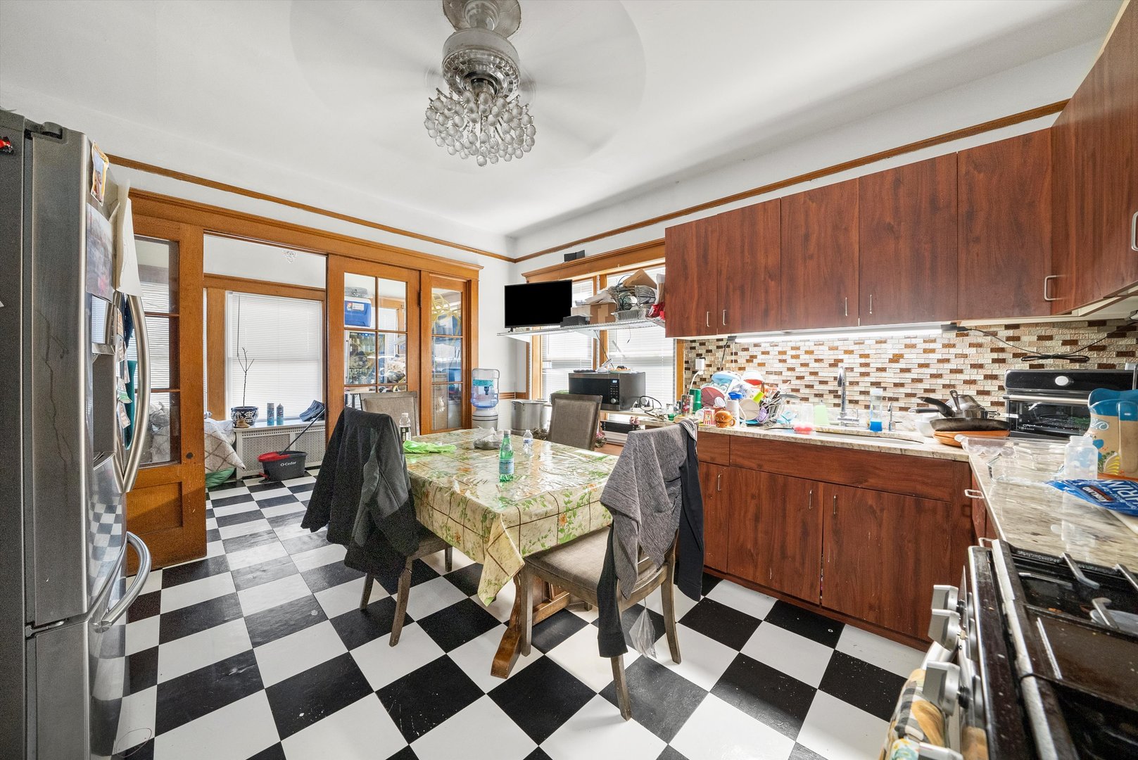2345 South 59th Court Cicero, IL 60804 - Photo 10 of 36 a view of a dining room with furniture window and outside view