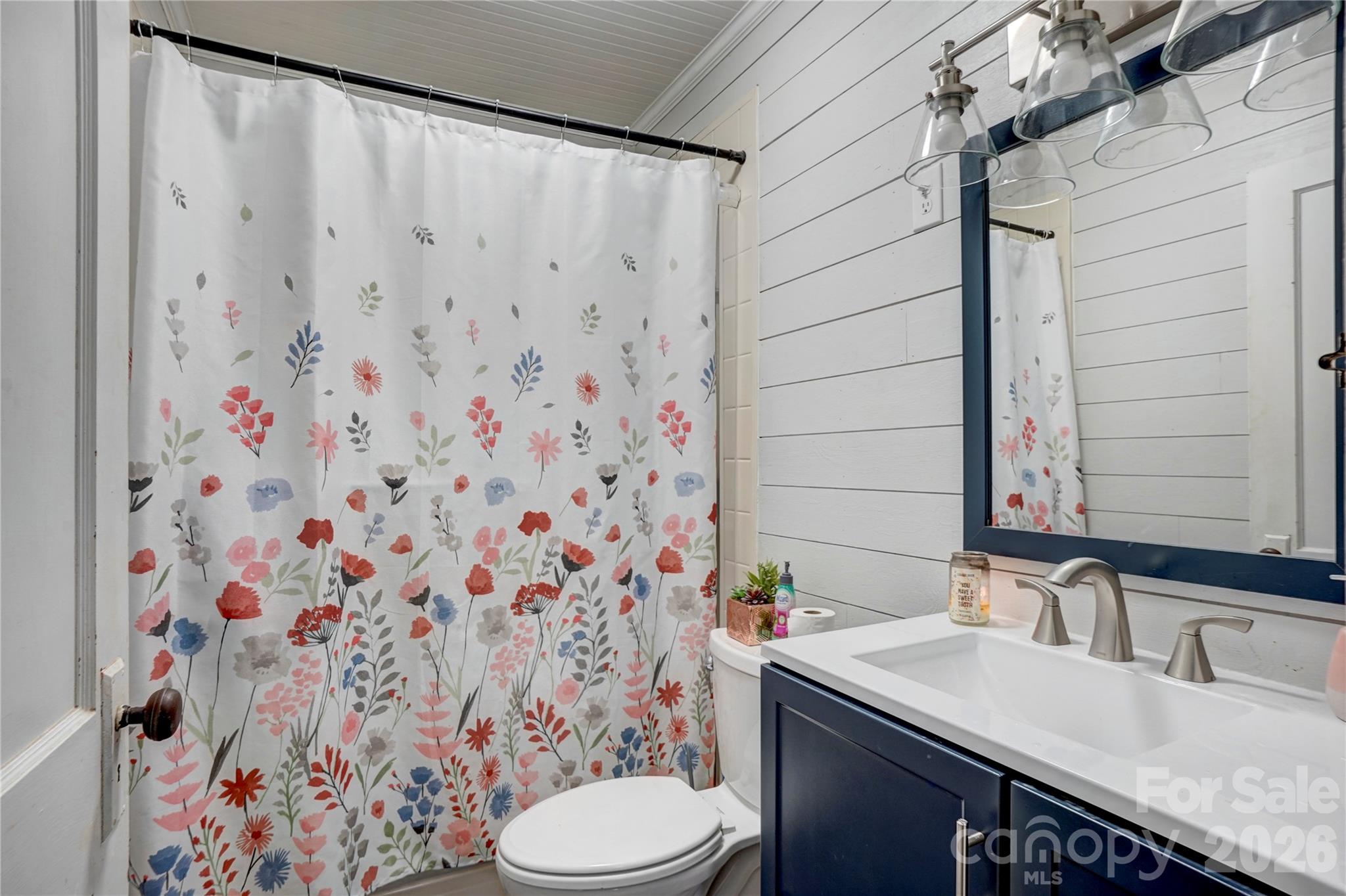 2495 Centergrove Road Kannapolis, NC 28083 - Photo 11 of 36 a bathroom with a sink toilet and shower
