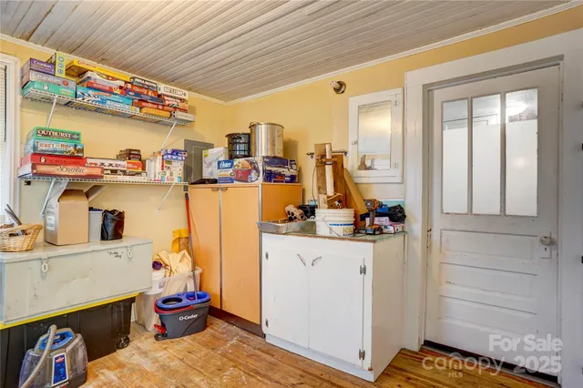 a view of storage and utility room