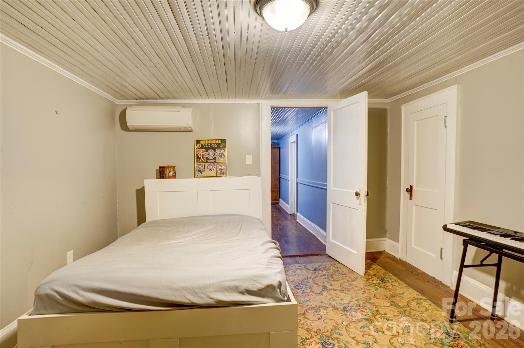 2495 Centergrove Road Kannapolis, NC 28083 - Photo 25 of 36 a spacious bedroom with a bed and a table in it