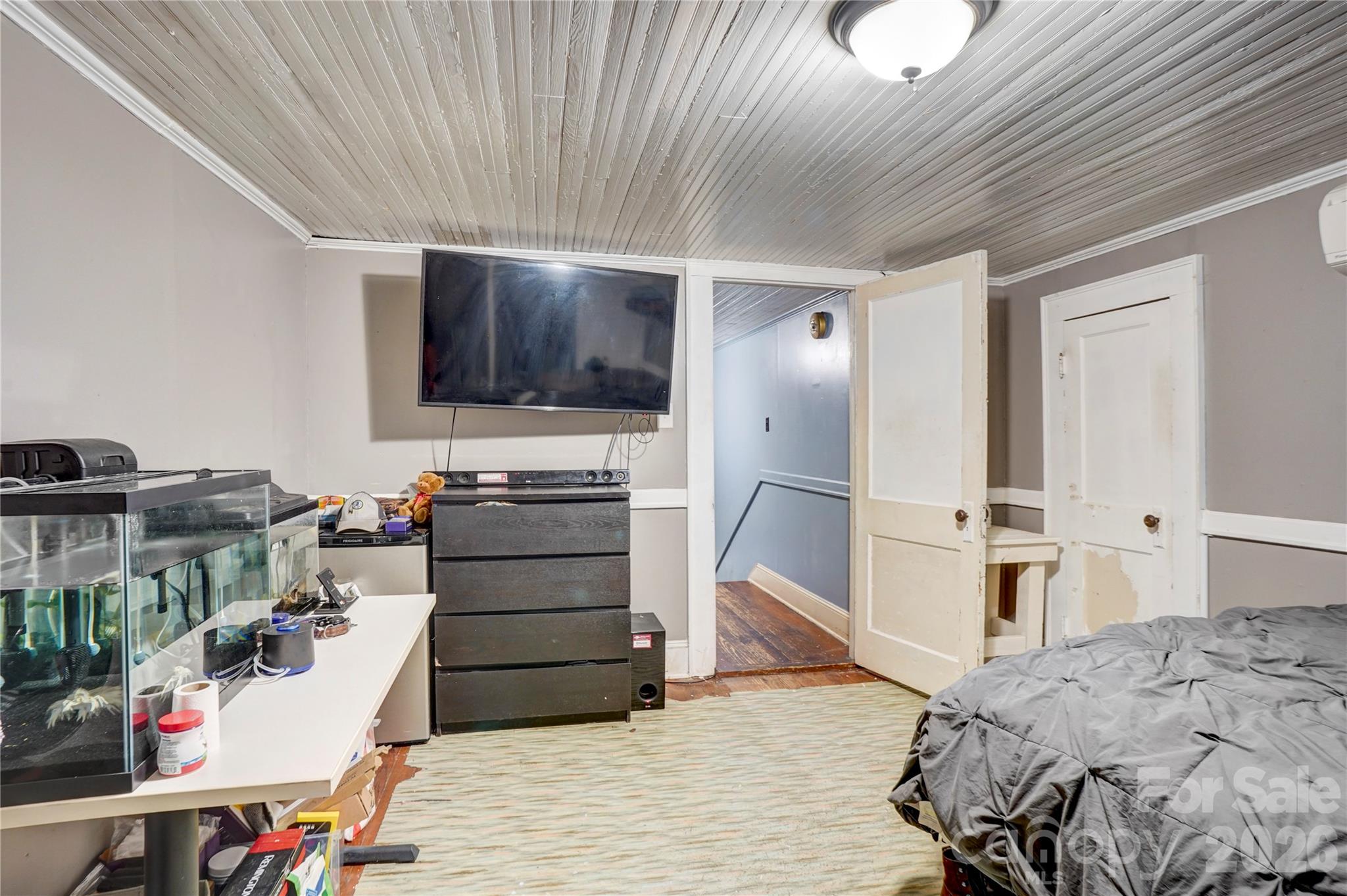 2495 Centergrove Road Kannapolis, NC 28083 - Photo 26 of 36 a bed room with a bed and a television