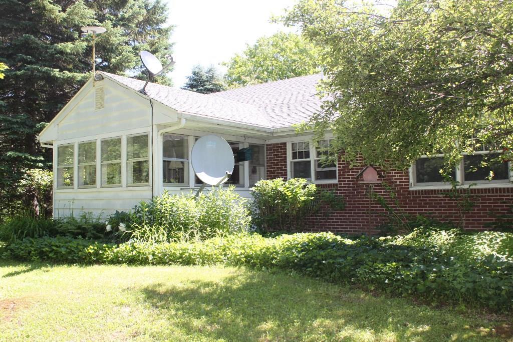 277 Howard Road Searsmont, ME 04973 - Photo 4 of 27 Exterior rear (sunroom).