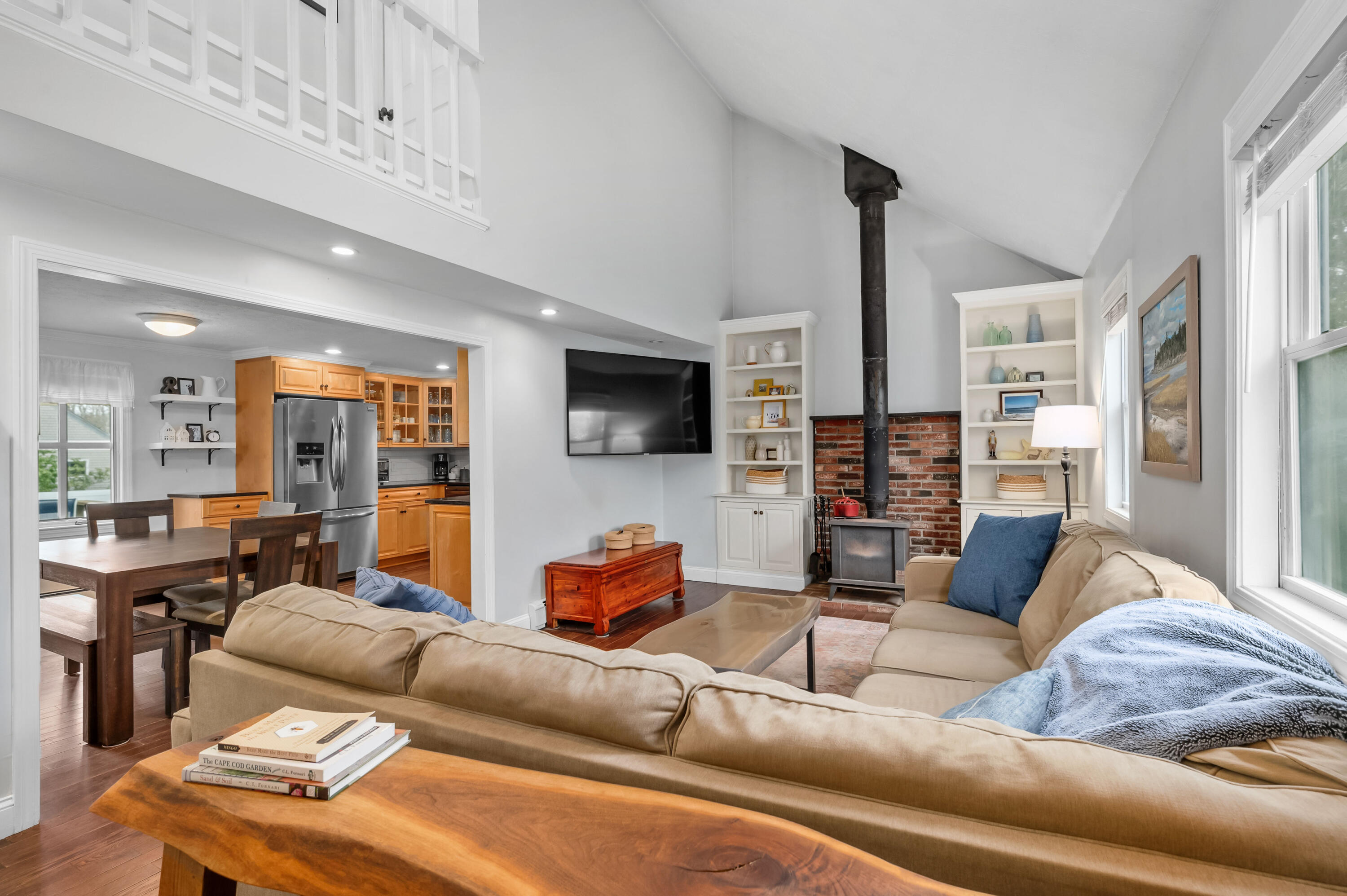 69 Jones Road Marstons Mills, MA 02648 - Photo 6 of 22 a living room with furniture and a flat screen tv