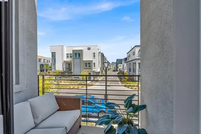a view of a living room filled with furniture