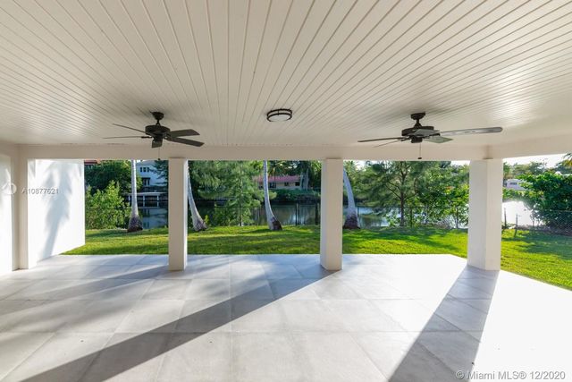 a view of a porch and garden