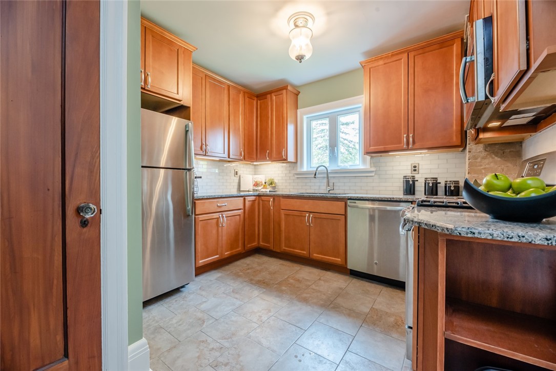 400 Laurelton Road Irondequoit, NY 14609 - Photo 15 of 38 Original charm meets modern convenience in this go