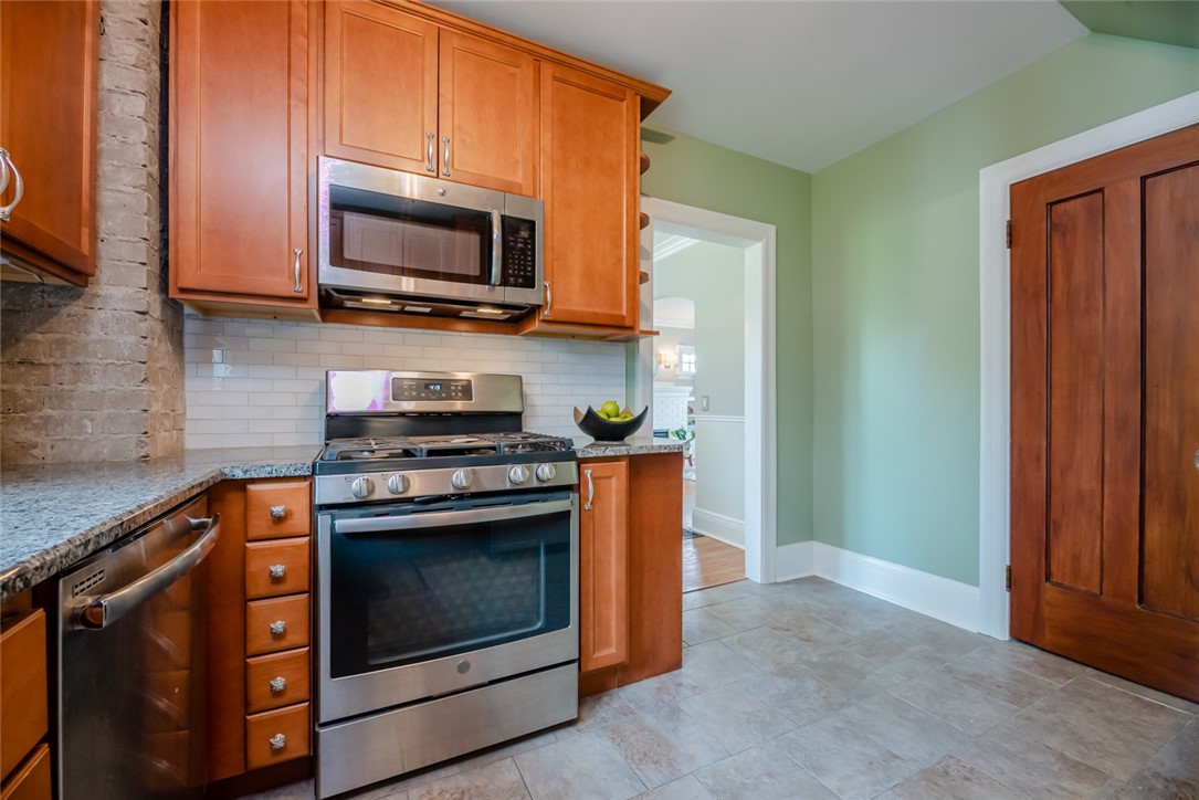 400 Laurelton Road Irondequoit, NY 14609 - Photo 17 of 38 Stainless steel appliances complete the look.