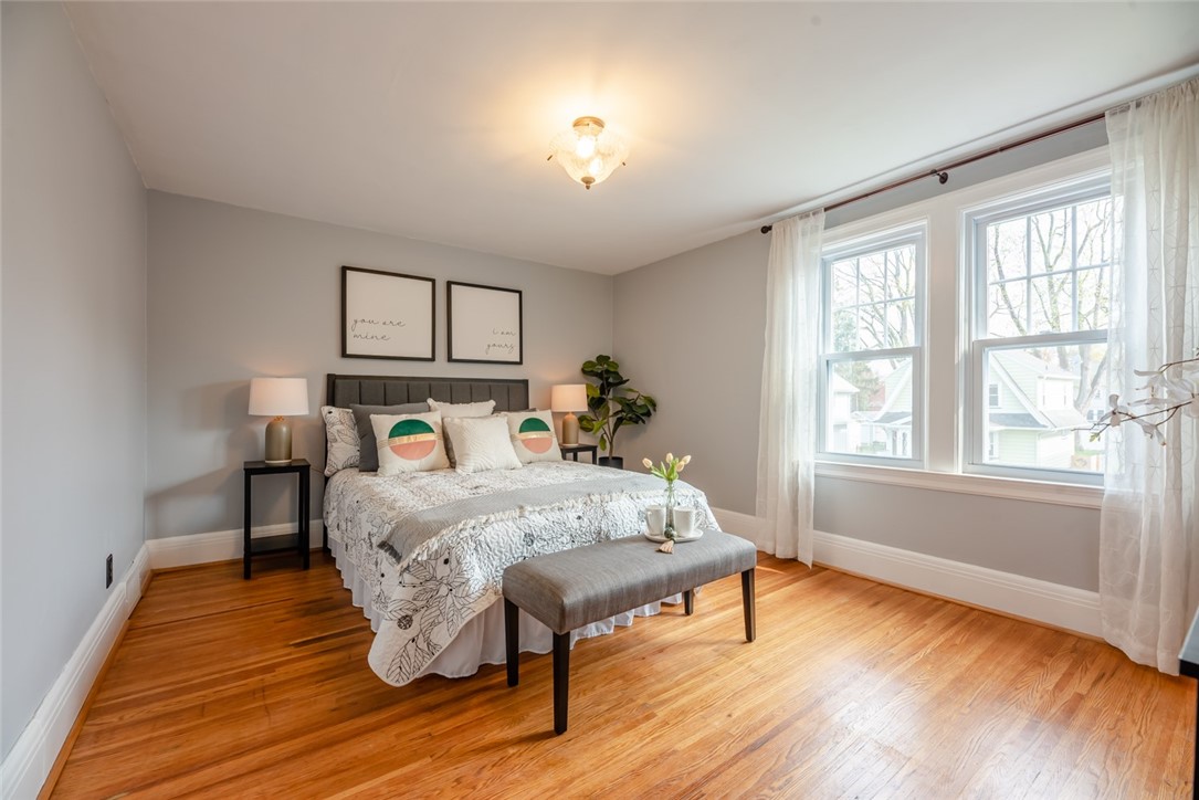 400 Laurelton Road Irondequoit, NY 14609 - Photo 19 of 38 The large primary bedroom with soothing colors and