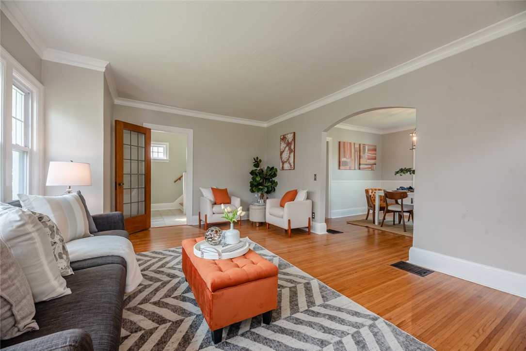 400 Laurelton Road Irondequoit, NY 14609 - Photo 5 of 38 Spacious and bright, original hardwood floors anch