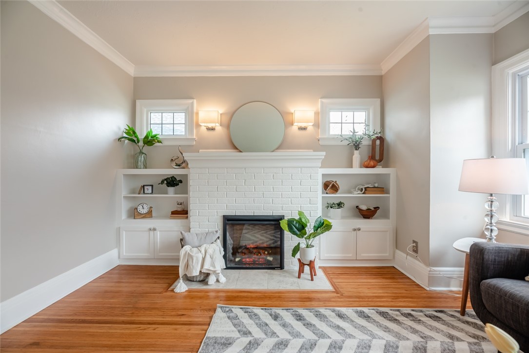 400 Laurelton Road Irondequoit, NY 14609 - Photo 9 of 38 Generous built-ins complete the vibe on the firepl