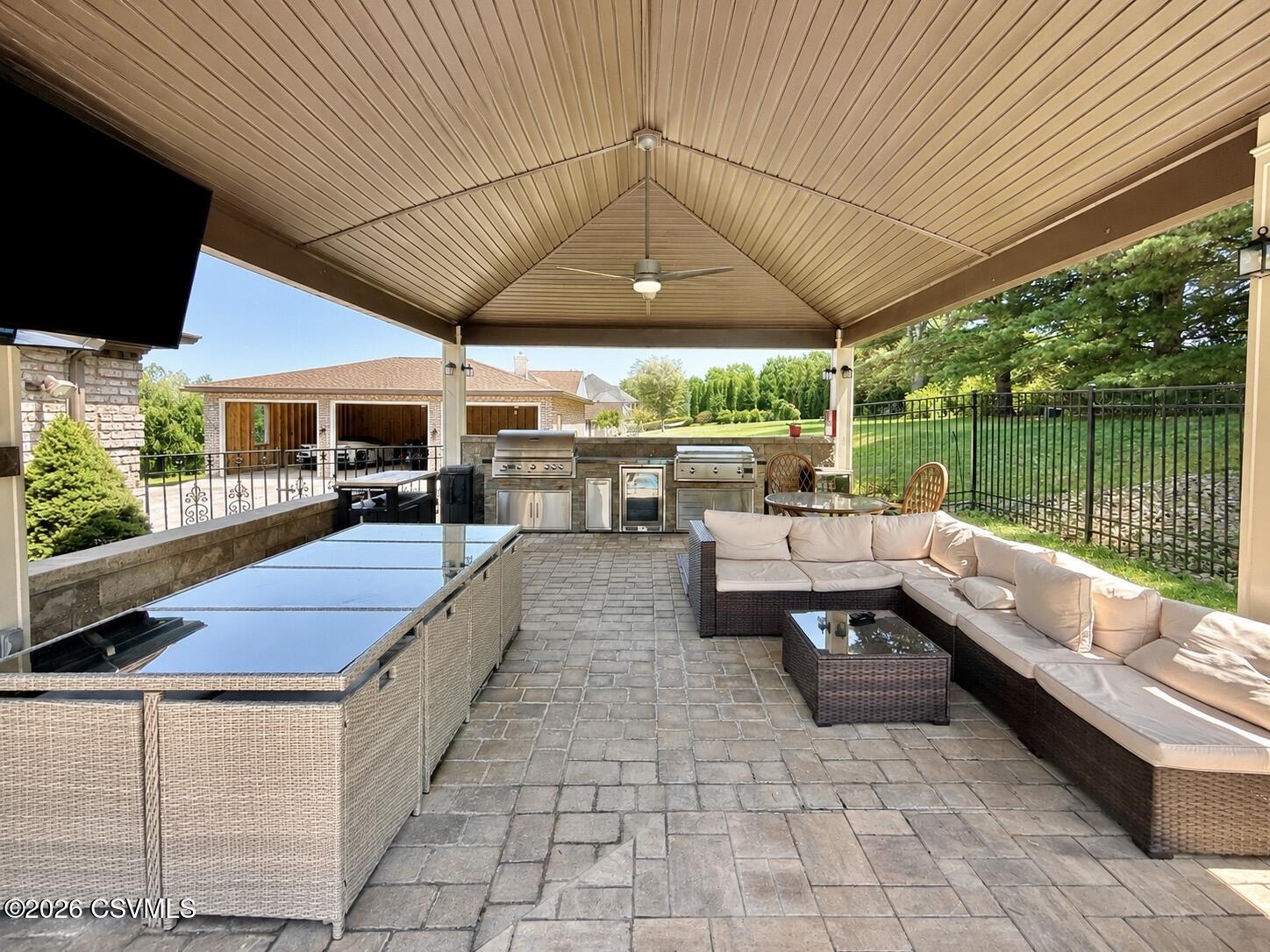 50 Sweet Gum Road Selinsgrove, PA 17870 - Photo 24 of 82 a view of a patio with a table and chairs under an umbrella with a patio