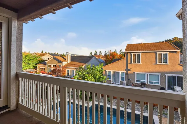 a sitting area with furniture and a potted plant