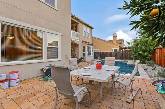a view of a house with swimming pool