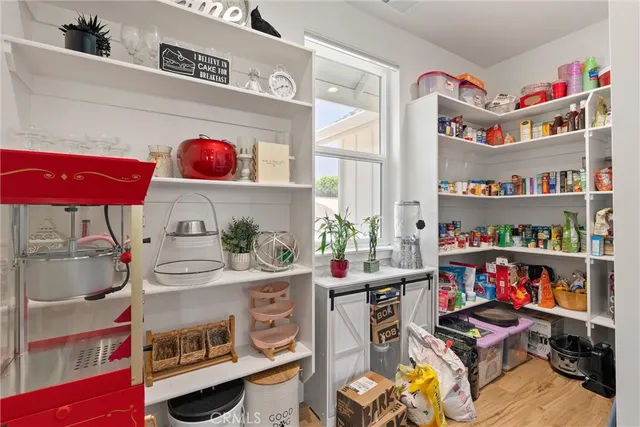 a room with furniture and a workspace