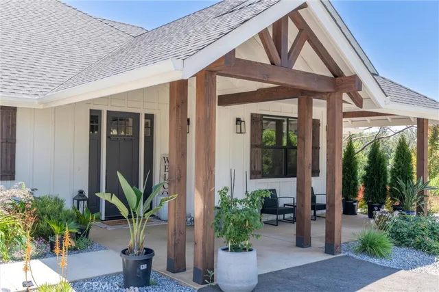 a potted plant in front of a house
