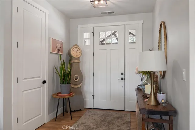 a view of entryway with livingroom