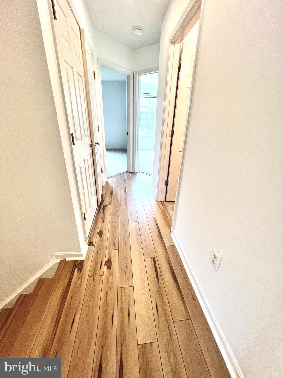 6688 Roderick Loop Gainesville, VA 20155 - Photo 18 of 40 a view of wooden floor in a room