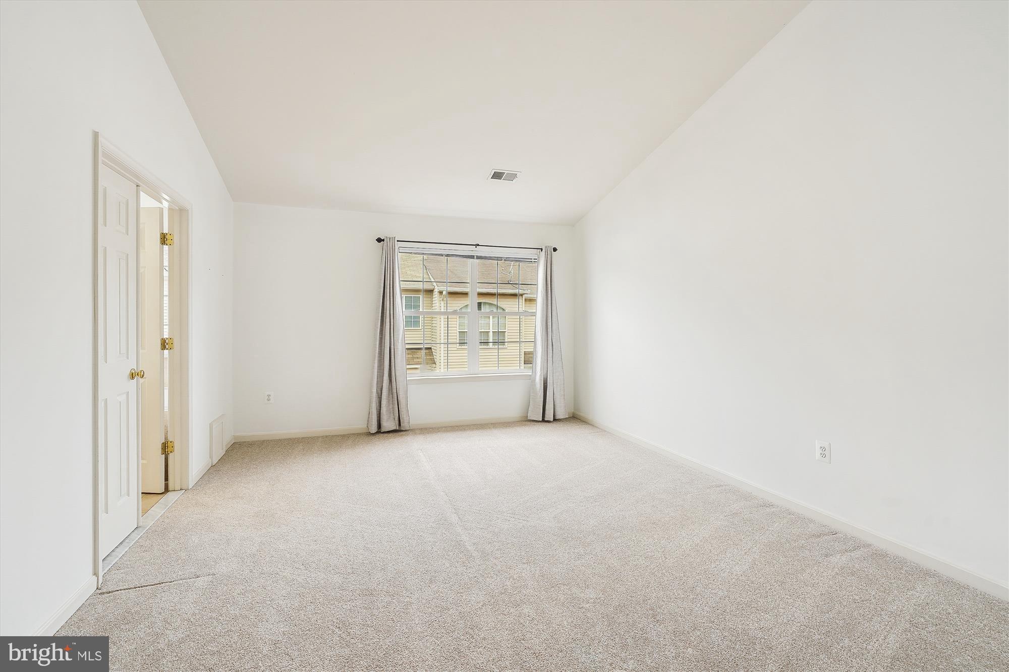 6688 Roderick Loop Gainesville, VA 20155 - Photo 21 of 40 an empty room with windows