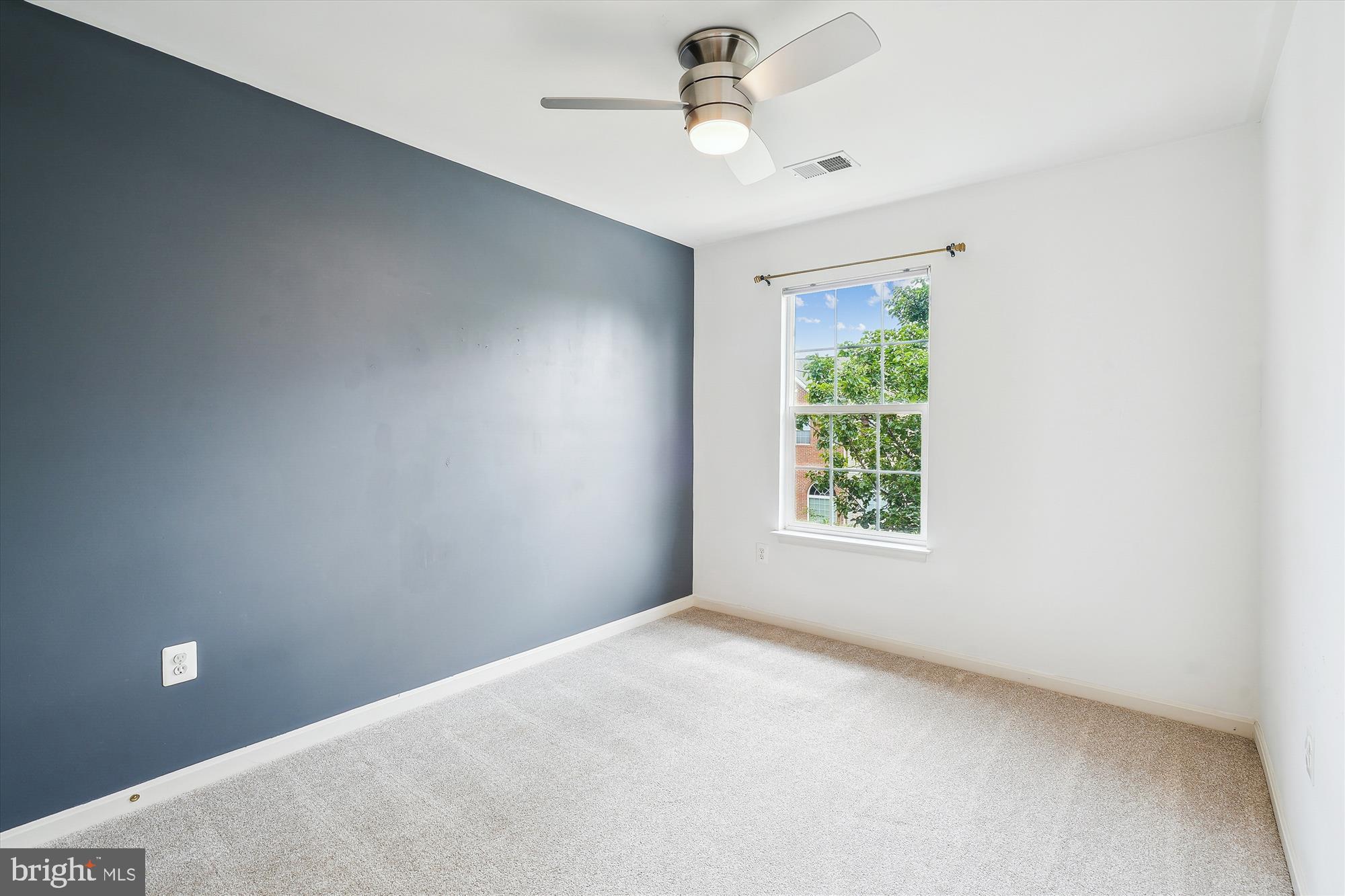 6688 Roderick Loop Gainesville, VA 20155 - Photo 25 of 40 a view of an empty room with a window