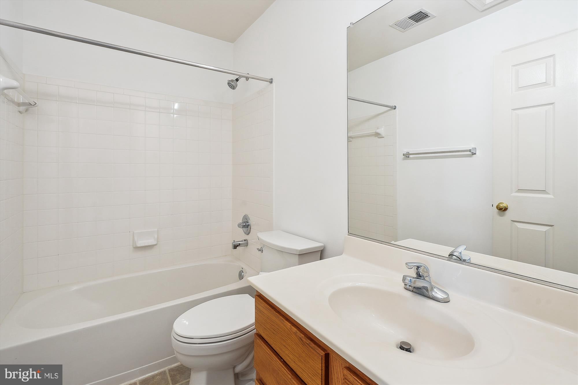 6688 Roderick Loop Gainesville, VA 20155 - Photo 26 of 40 a bathroom with a sink toilet and shower
